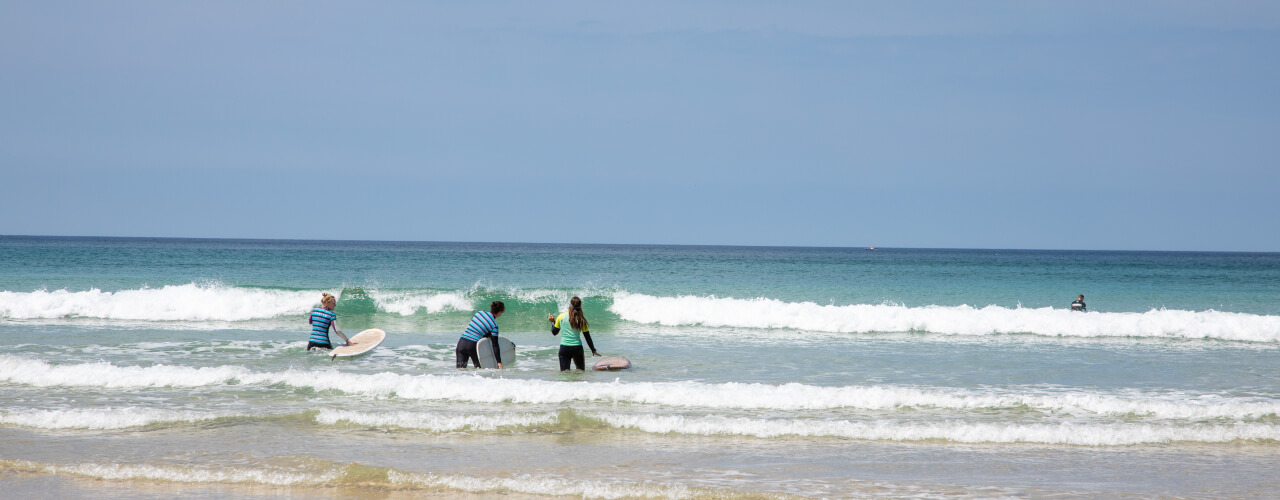 Surfers on Fistral Beach